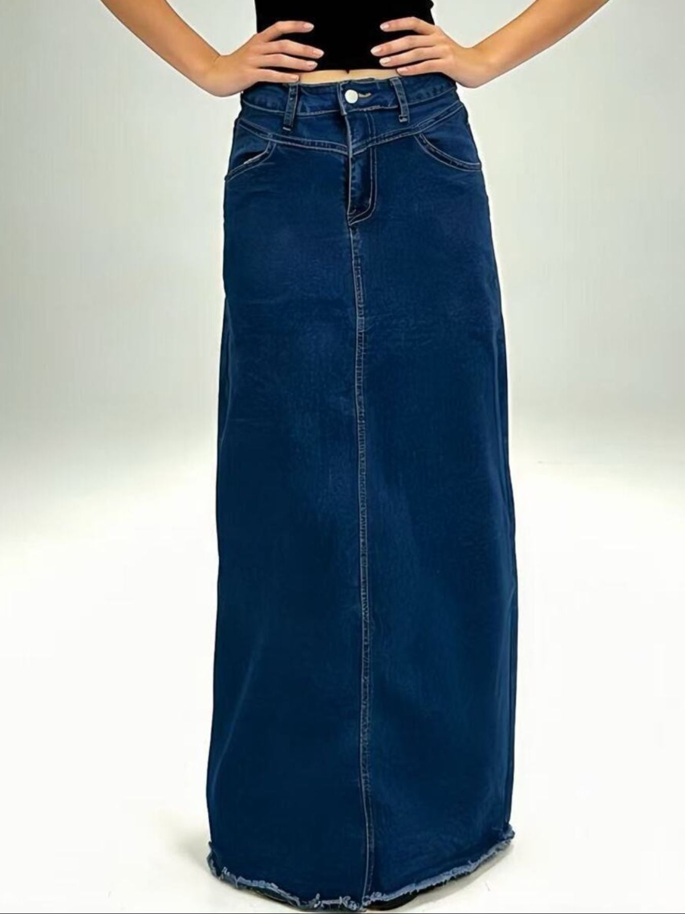 Raw Hem Maxi Denim Skirt with front button closure in dark blue denim, 85% cotton / 15% polyester.
