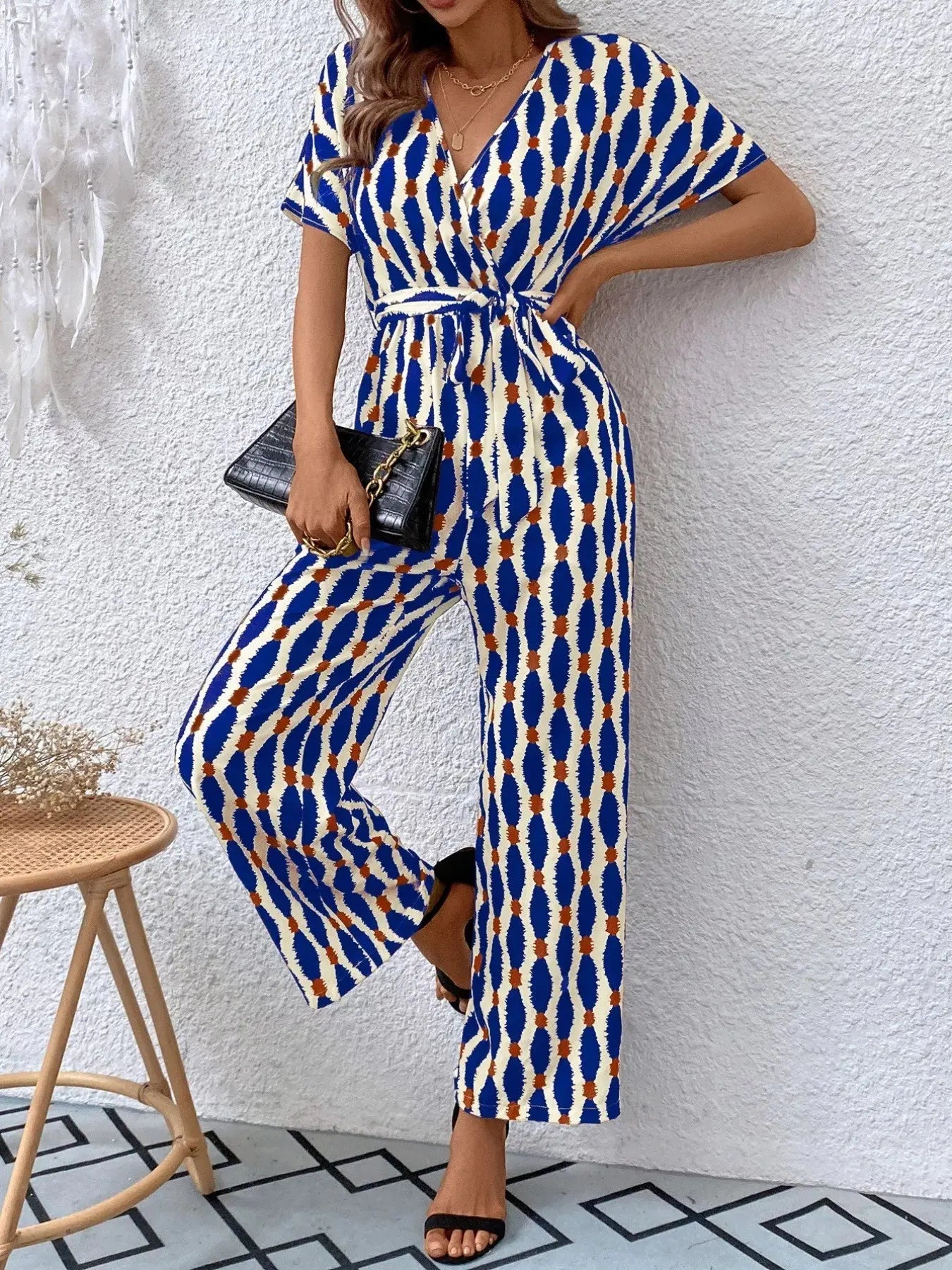 Printed Surplice Tie Waist Short Sleeve Jumpsuit Trendsi