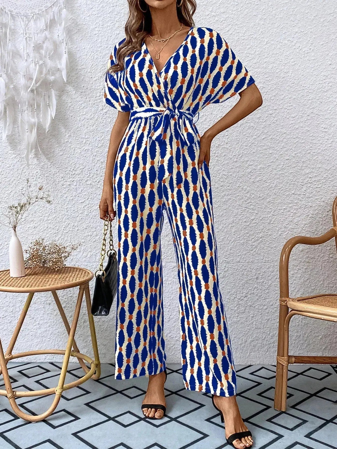 Printed Surplice Tie Waist Short Sleeve Jumpsuit Trendsi