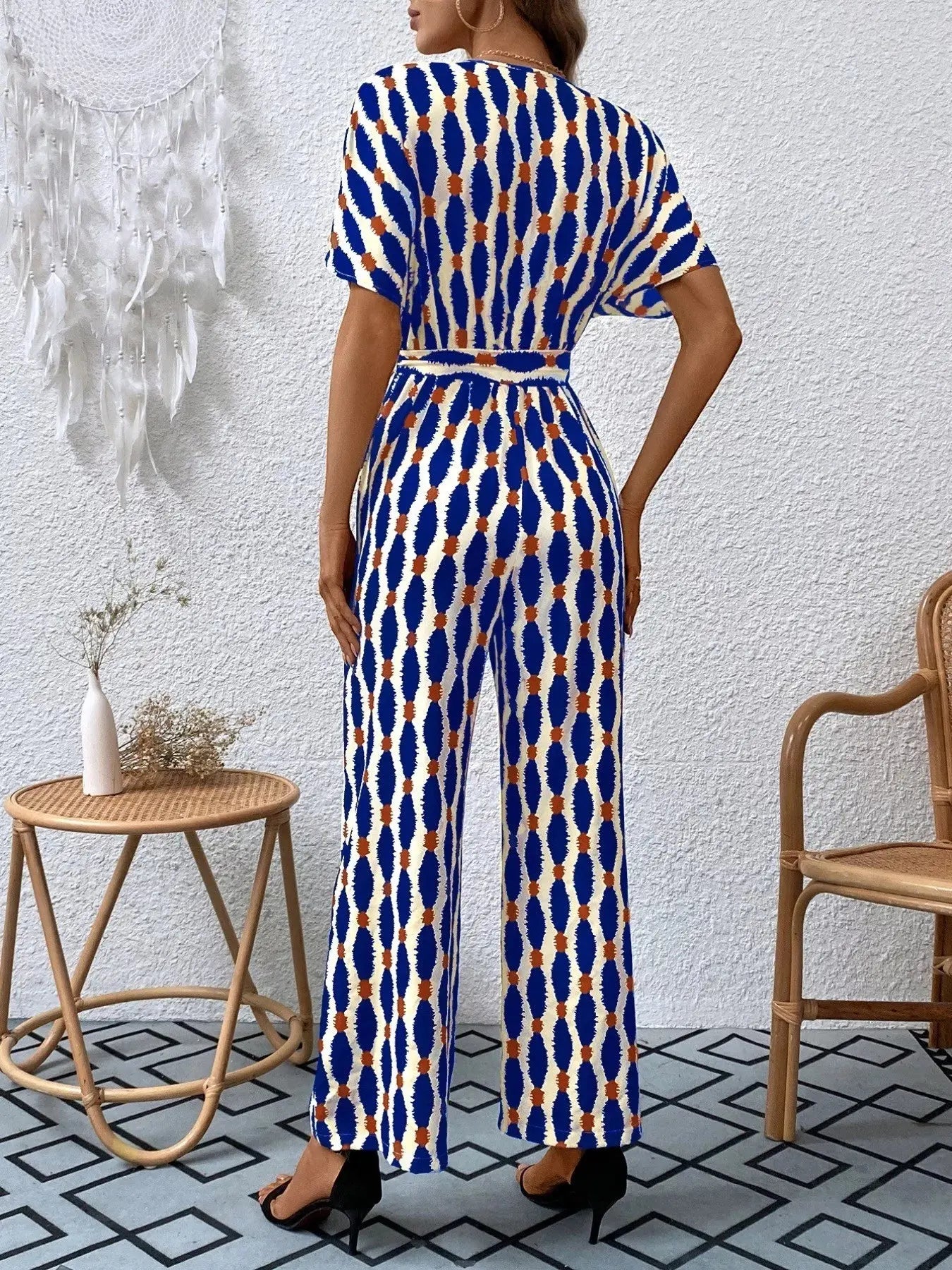 Printed Surplice Tie Waist Short Sleeve Jumpsuit Trendsi