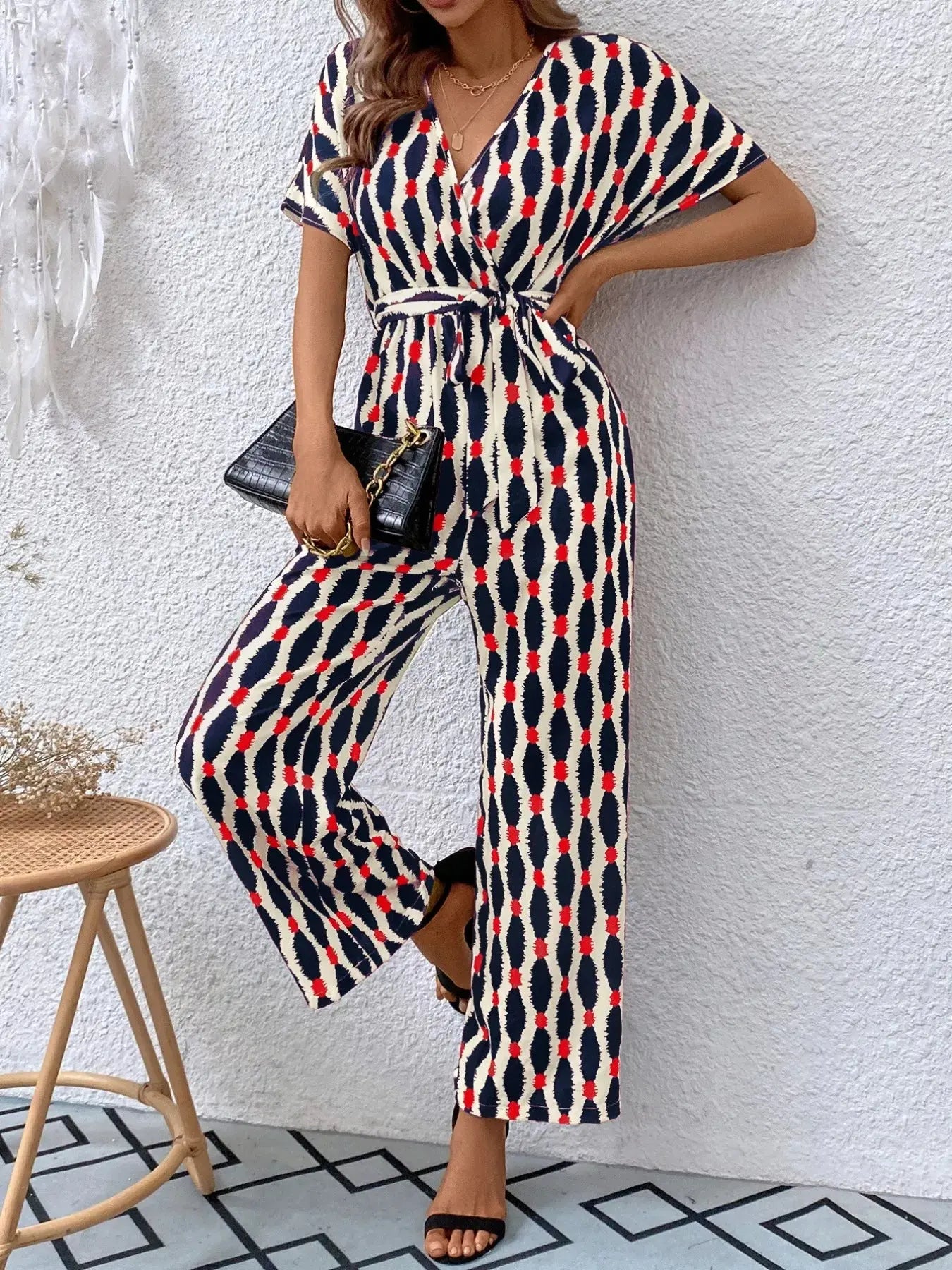 Printed Surplice Tie Waist Short Sleeve Jumpsuit Trendsi