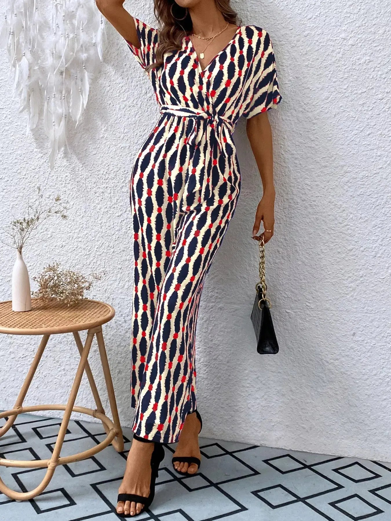 Printed Surplice Tie Waist Short Sleeve Jumpsuit Trendsi