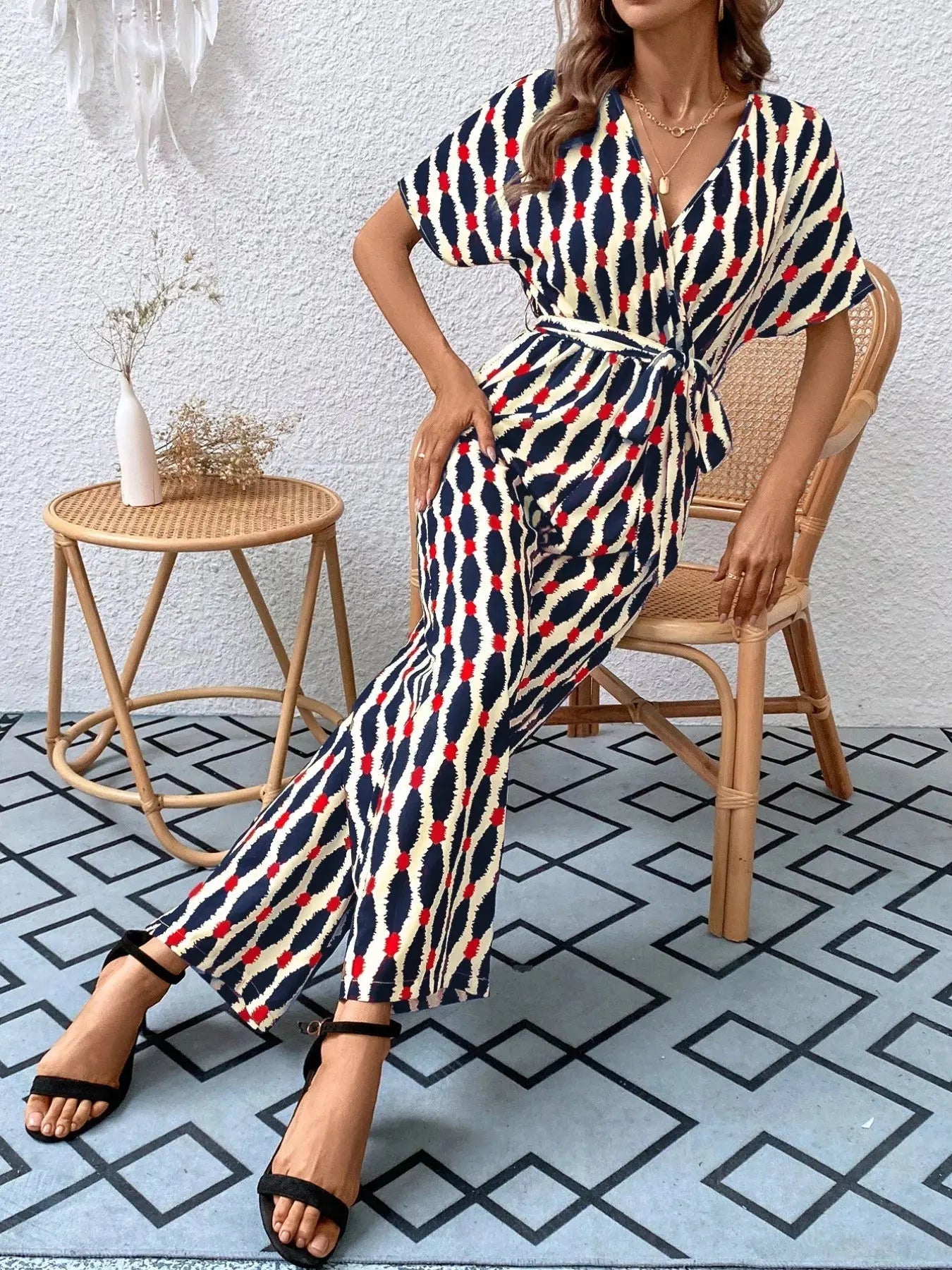 Printed Surplice Tie Waist Short Sleeve Jumpsuit Trendsi