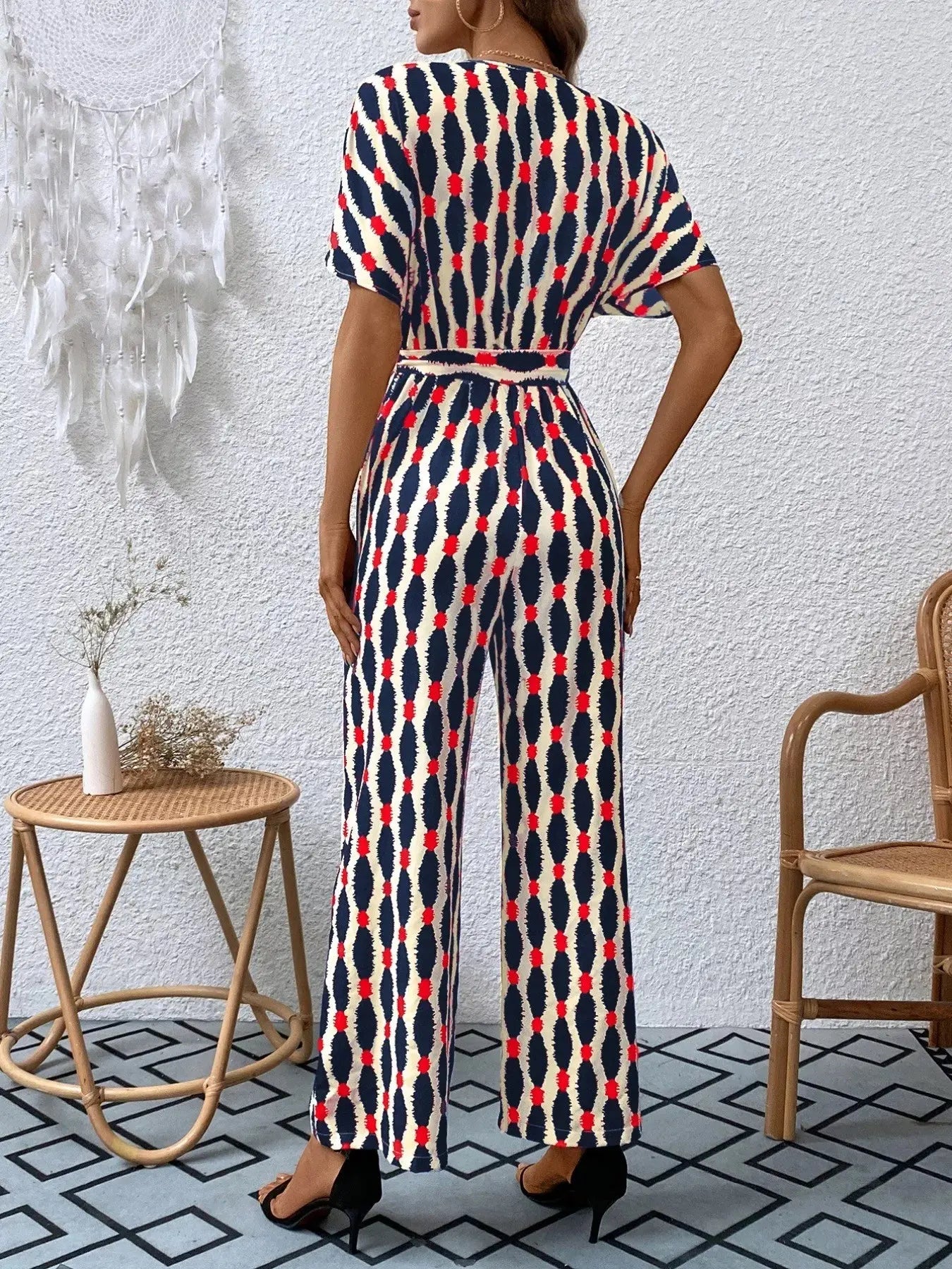 Printed Surplice Tie Waist Short Sleeve Jumpsuit Trendsi