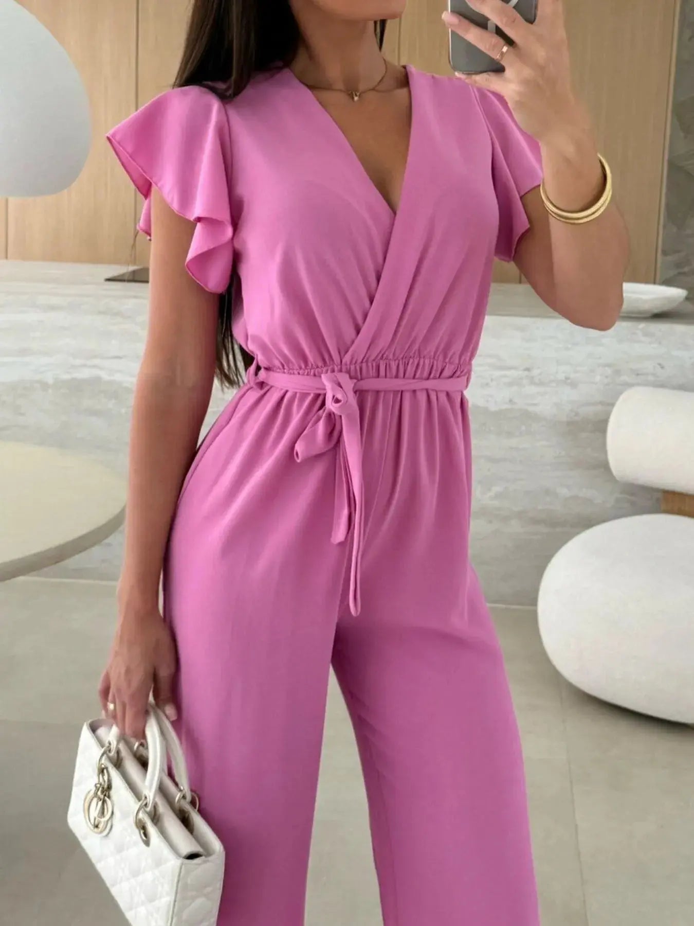 Surplice Wide Leg Belted Jumpsuit Trendsi