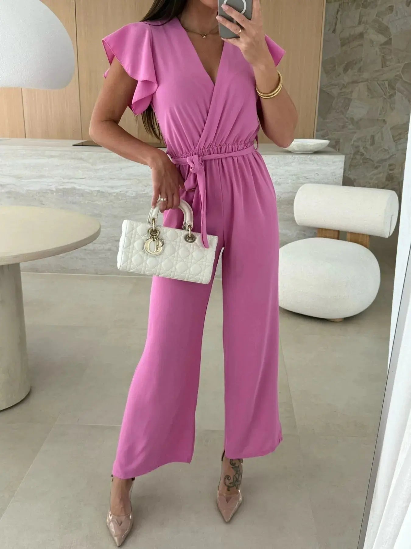 Surplice Wide Leg Belted Jumpsuit Trendsi