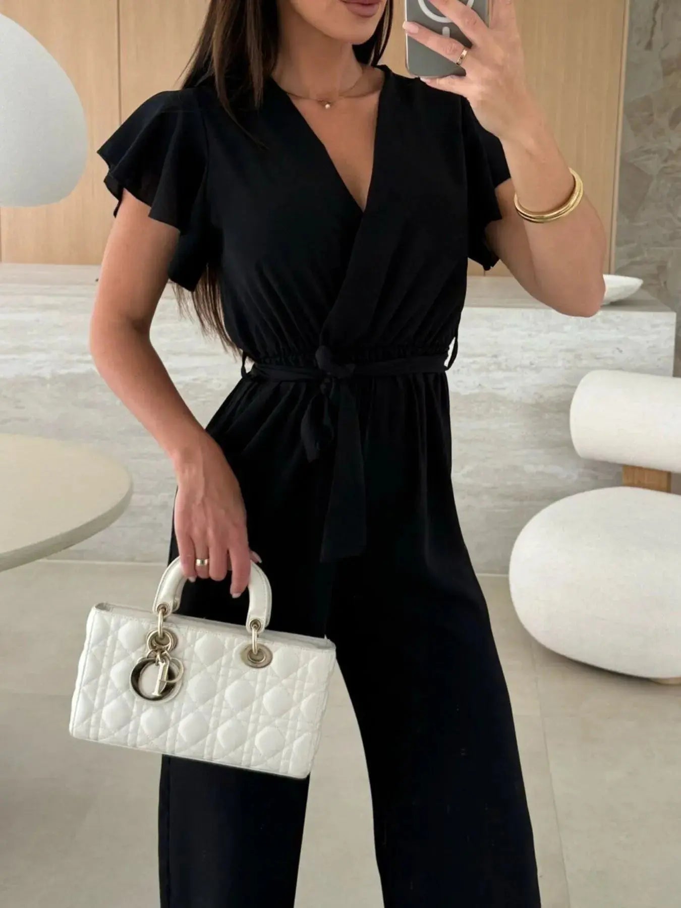 Surplice Wide Leg Belted Jumpsuit Trendsi